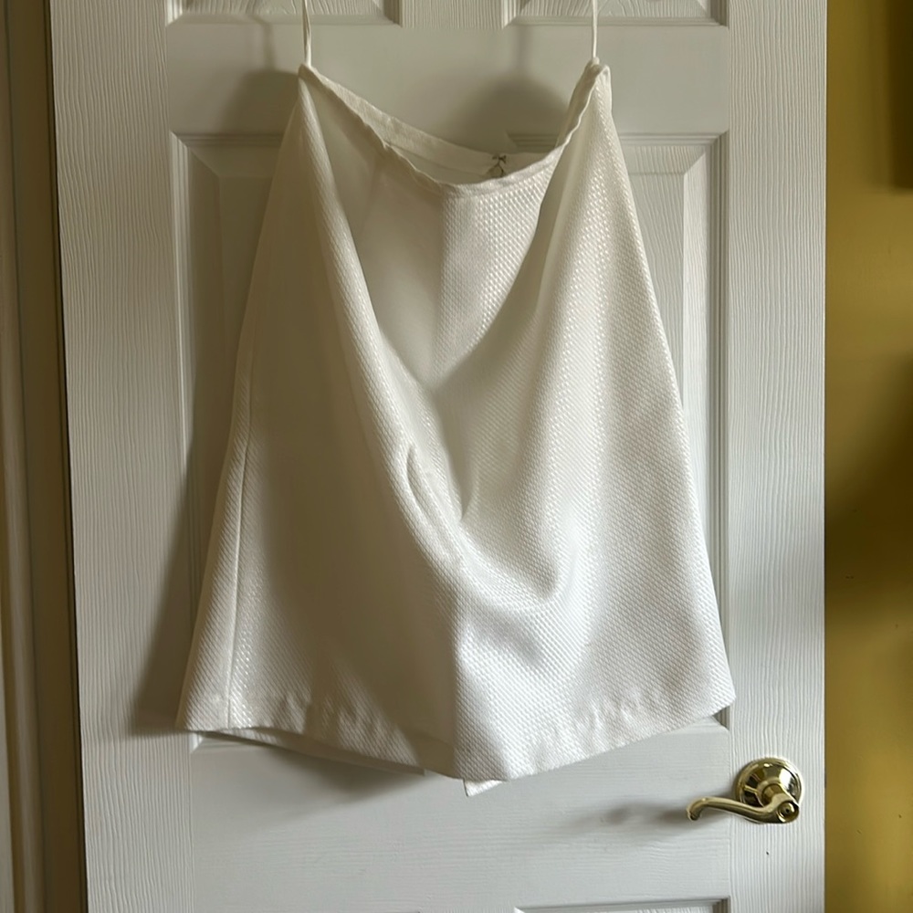 White skirt suit with rhinestone buttons